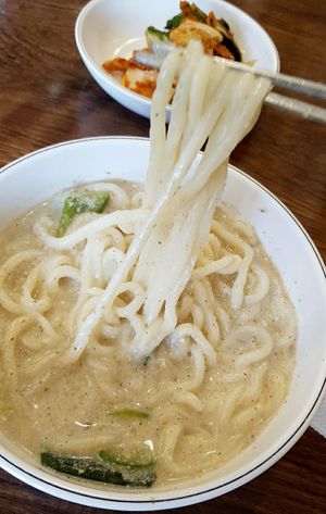 Hand-cut noodles in perilla seed soup 들깨칼국수 - close-up at Saenggak Boda Masitneun Jip in Seoul