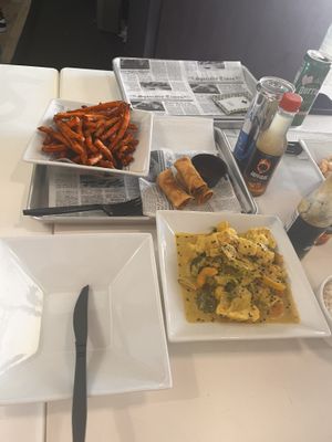 Spring rolls, veggie curry, and sweet potato fries   at Sabia Plant Based Eatery in Guaynabo