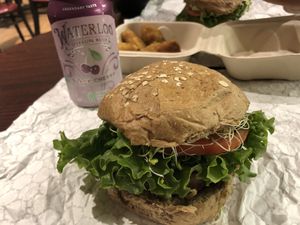 Beyond Burger and a whole wheat bun ♥️So yum!! Love the sprouts too!! at Down to Earth - Store and Deli in Kahului