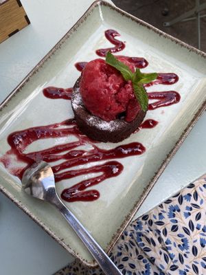 Vegan chocolate cake - souffle! Insanely delicious. Topped with sorbet.  at Smokvica - Kralja Petra in Belgrade