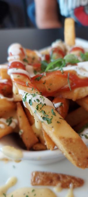 Loaded trash fries and worth every bit of carb coma you will experience.   Absolutely delicious.   at Paisley Vegan Kitchen in Melbourne
