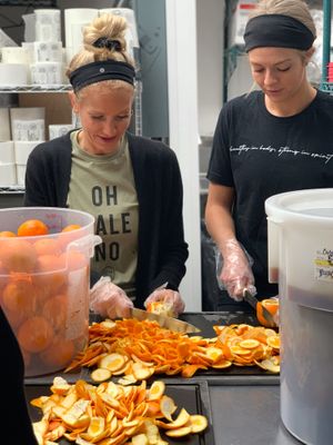 Prepping for Orange at Clean Juice in Lincoln