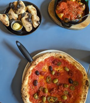 Greta, dough balls and potatoes at Grumpy's Bar + Wood Fired Pizza in Farsley