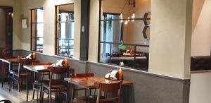 Individual seat with transparent glass to the 2nd flat. at Evergreen Vegetarian - DN Branch in Phnom Penh