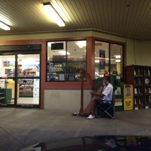 harp man outside the entrance at Hawaiian Moons Market in Kihei