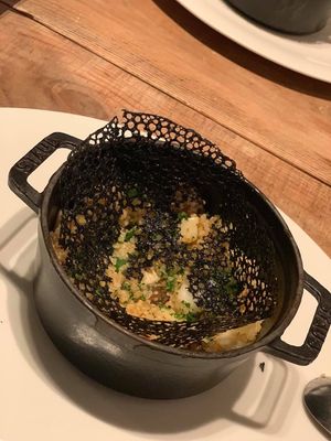 Quinoa with bamboo shoots and vegetables with bamboo charcoal net on top at Chez Tomo in Tokyo