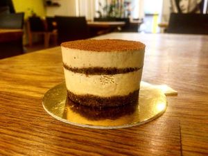 Raw Tiramisu (plant based) Sweet coffee dessert from coconut oil and milk, almond and ceshew, cinamon, coconut sugar and buckwheat. at Vegato-Vaclavak in Prague