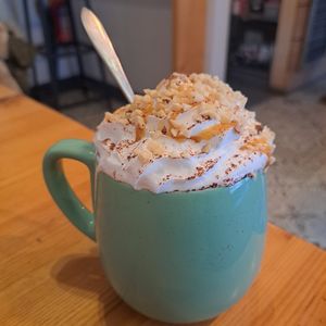 Peanut butter hot chocolate with vegan squirty cream at Black Cactus  in Blandford Forum