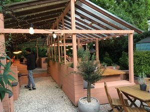 Outdoor seating area, heated lamps on each table. at Döner Summer in York