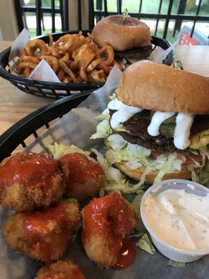 Korny Burger w/ curly fires. Bottle Kap Burger w/ cauliwyngs. at Korny Vibes in Houston