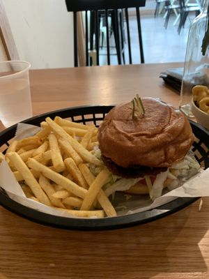 Vegan burger with fries at Korny Vibes in Houston