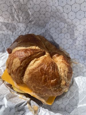 Breakfast croissant with just egg, breakfast sausage, vegan bacon and cheese   at Korny Vibes in Houston
