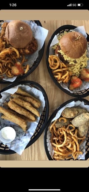 Fried cauliflower, fried chicken sandwiches, fried pickles, fried jalapeño poppers and fries!  at Korny Vibes in Houston
