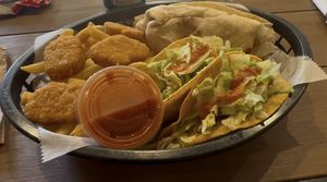 Munchie Box: fries, chick’n nuggets (4), burrito, tacos (2)  at Korny Vibes in Houston