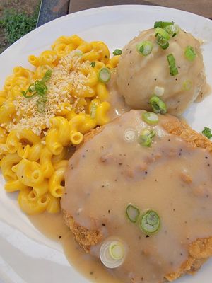 Chick'n fried chick'n with mashed potatoes and mac n' chz at Korny Vibes in Houston