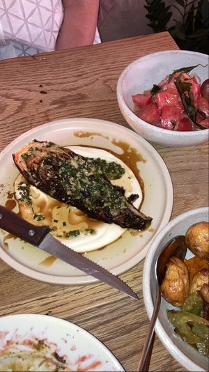 Roast hispi cabbage, curry leaf water melon salad.  at Bubala - Spitalfields in East London