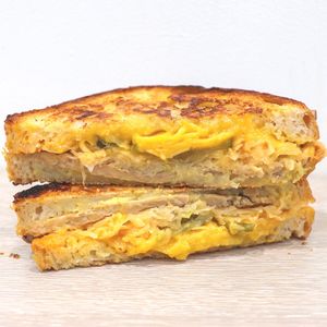 The Reuben - tempeh, sauerkraut, pickles, russian sauce, mistard & 'cheddar' at Jumi's Cafe in South Yarra