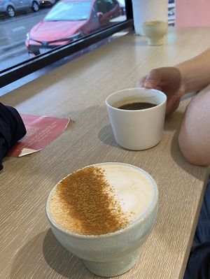 chai latte and long black   at Jumi's Cafe in South Yarra