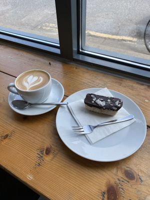 Flat white and vegan bounty bar  at Groundstate Coffee in Dublin
