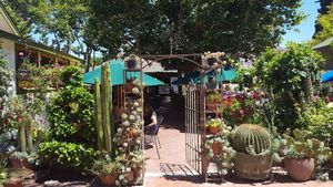 outside patio next to epic flower garden  at Jardines de San Juan in San Juan Bautista