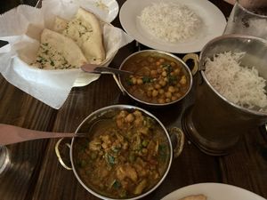 Channa masala, vegan (front), vegetable chettinadu, vegan (middle), with basmati rice and naan bread at Tikka Bar in Key West