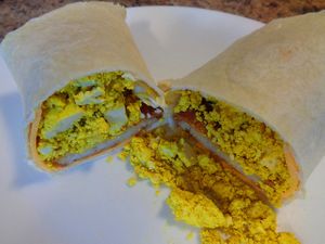 Eggz, & Cheeze Breakfast Burrito. Tofu eggz, vegan cheddar, and a hash brown patty wrapped in a flour tortilla.  at Birch Cafe in Highland Heights