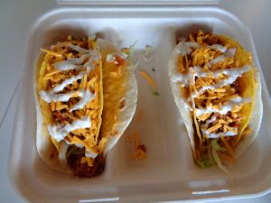 Gordita Taco Special- flour tortilla, melted cheese, crunchy tortilla, tvp beef, lettuce, ranch, cheddar. Got a double order to make 2. Vegan. at Birch Cafe in Highland Heights