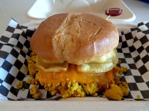 Pierogi Breakfast Sandwich Special. Brioche bun buttered and toasted and then topped with tofu eggs, melted cheddar, crispy bacun, and pierogi. at Birch Cafe in Highland Heights