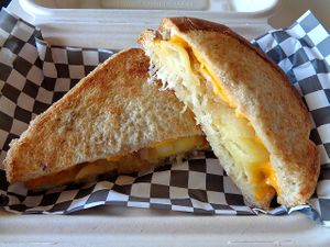 Pierogi Grilled Cheese special. Pierogi, grilled onions, kraut, cheddar. Vegan. at Birch Cafe in Highland Heights