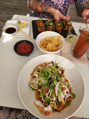 Sushi, chips and salsa, fish tacos at The Village in San Diego