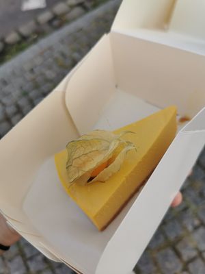 Vegan mango tofu cheesecake. Very tasty. at Bread House in Torun