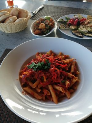 Penne with tomato sauce and vegetables, coriander patato and grilled vegetables  at Sidra By The Citadel in Alexandria