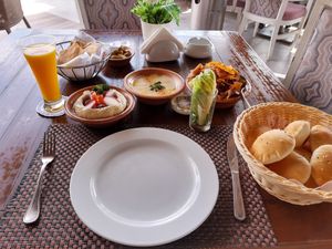 Hummus with falafel, tahini, & fattoush at Sidra By The Citadel in Alexandria