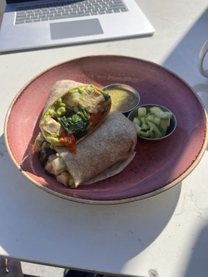 Breaky burrito with added ingredients and side of cucumber   at Farm and Craft in Scottsdale