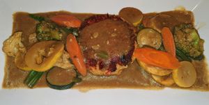 Curry Grit Cake Medley at Alvin and Friends in New Rochelle