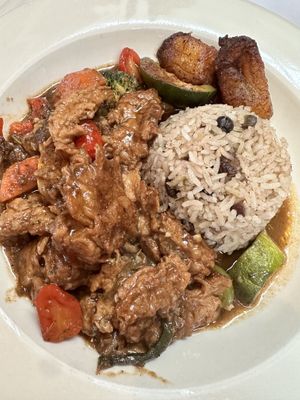 Vegan jerk chicken (seitan) with rice, veggies, and plantains  at Alvin and Friends in New Rochelle