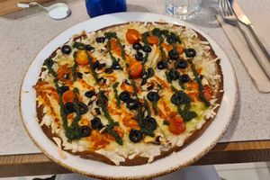 Vegan pizza (replaced mozzarella by vegan cheese) at Naked and Sated - Estébanez Calderón in Madrid