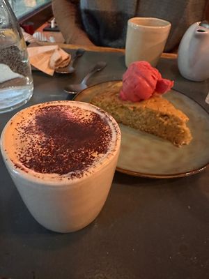 Oat cappuccino; orange cake (delicious)  at Sesame in Chamonix-mont-blanc