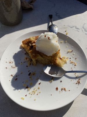 Forgot to photo the dessert while it still looked beautiful! Orange cake with lemon sorbet and chopped nuts. It was lovely    at Sesame in Chamonix-mont-blanc