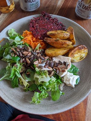 Beetroot fritter with salad and potatoes at The Veg Box Cafe - Canterbury in Canterbury
