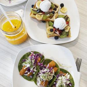 Passion fruit juice. Waffles with amazing coconut whip.  Crispy and delicious gardein fish tacos.  This place is a win! at El Verde Comic Café in Rio Grande