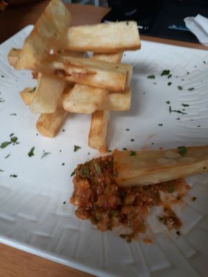 Fried Yams Pepper Sauce at Tatale Vegan Restaurant in Accra