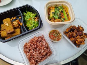 Absolutely delicious food delivery! Tatale, chickpea and vegetable curry with extra tofu at Tatale Vegan Restaurant in Accra