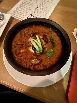Fufu in palm nut soup  at Tatale Vegan Restaurant in Accra