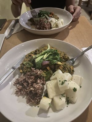 Egusi with boiled yam and brown rice  at Tatale Vegan Restaurant in Accra