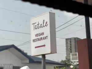 Restaurant sign  at Tatale Vegan Restaurant in Accra