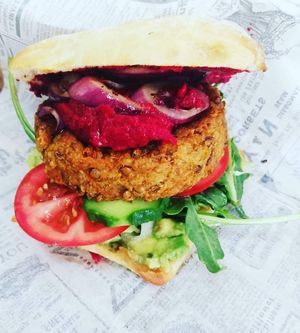 Vegan lentil burger with beetroot hummus at Frutopia Palm Mar in Tenerife