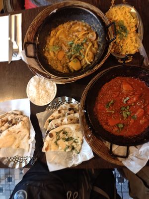 Vegetable Madras, Vegetable Dhansak, two types of rice and naan at Archana in Belfast