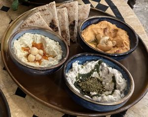Starter normal and paprika hummus, baba ganush +pita  at Casa Qurtubah in Cordoba