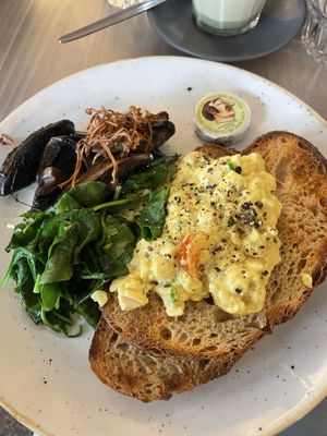 Scrambled Tofu and tomato served with mushrooms and spinach  at Barzura in Coogee